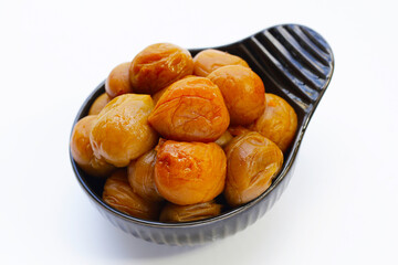 Pickled plums on white background.