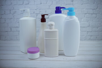 Set of plastic pump bottles body care beauty products of shampoos and shower cream