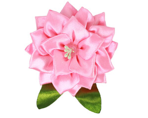 pink fabric brooch made of satin ribbon without background