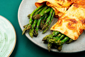 Delicious omelette with asparagus