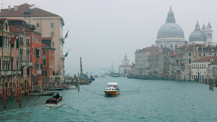Venice in winter fog. Grand Canal and Basilica di Santa Maria della Salute, view from Ponte...