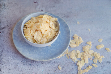 Organic almond flakes in a blue bow