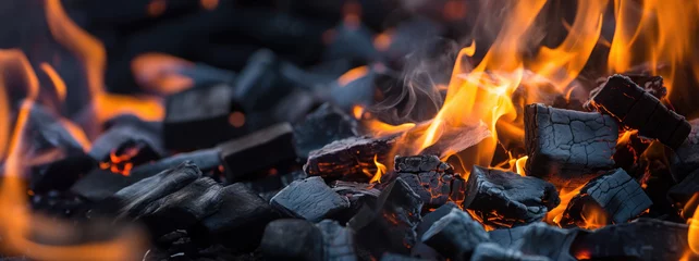 Gordijnen Burning firewood and coals of a fire close up. Background for grilled food with fire. © petrrgoskov