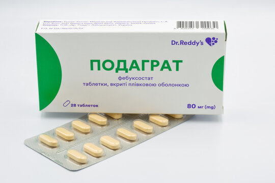 Pidagrat febuxostat tablets pack and blister closeup against white.