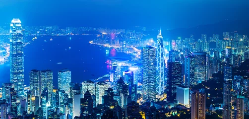 Foto auf Acrylglas Hong Kong cityscape with victoria harbour and large group of tall buildings at night © xy