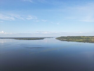 The river divides into two branches that go beyond the horizon.