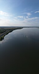Fototapeta premium Volga River, blue sky, strip of land. Landscapes of Russia.