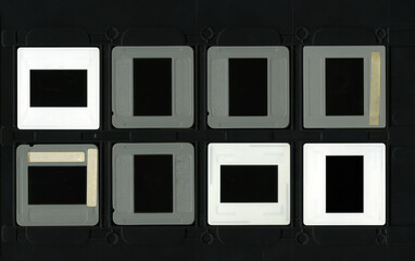 Old slides with frame on plastic black tray - 699553352
