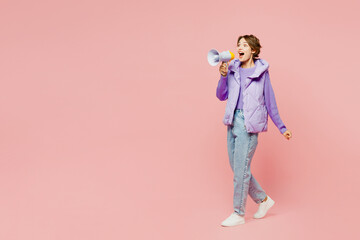 Full body young woman she wear purple vest sweatshirt casual clothes hold in hand megaphone scream...
