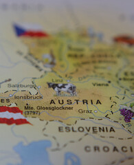 vertical map of Austria with the tourist map with the Austrian flag in travel concept