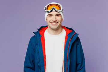 Close up skier cheerful fun man wear warm blue windbreaker jacket ski goggles mask looking camera...