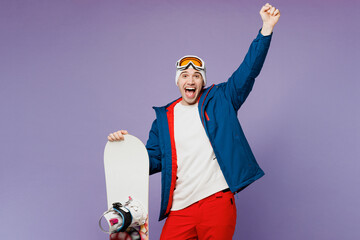 Happy man he wear warm blue windbreaker jacket ski goggles mask hat hold snowboard do winner...