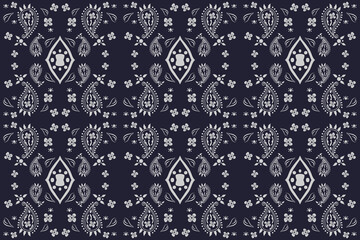 paisley ethnic embroidery on Black background.Ikat oriental seamless pattern traditional.Aztec style vector illustration.design for texture fabric