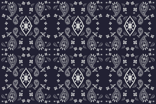 paisley ethnic embroidery on Black background.Ikat oriental seamless pattern traditional.Aztec style vector illustration.design for texture fabric