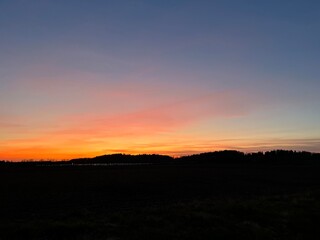 Fototapeta premium sunset over the field