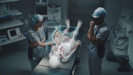 Diverse surgeons in AR headsets work in operating room using futuristic holographic display. 3D...