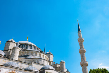 Fototapeta na wymiar Blue Mosque or Sultanahmet Mosque exterior view with domes and minaret