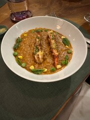 A plethora of Southeast Asia cuisune dishes - both main dishes and desserts, vegetarian and regular - from the kitchens of Bali and Phnom Penh