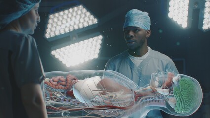 Diverse surgeons work in operating room. African American doctor talks with colleague, uses virtual holographic display with 3D graphics of human skeleton and organs. AR in medicine. Advanced surgery.