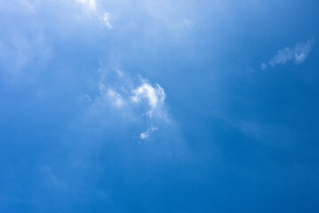 Blue sky and tiny white clouds for background.