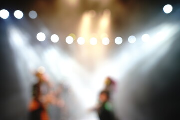 Defocused entertainment concert lighting on stage, blurred disco party and Concert Live.