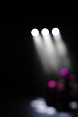 Defocused entertainment concert lighting on stage, blurred disco party and Concert Live.