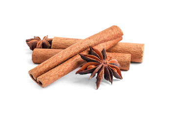 Aromatic cinnamon sticks and anise stars isolated on white