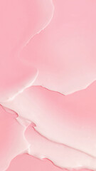 Textura de una crema de cosmética sobre fondo rosa.