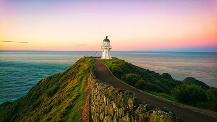 Foto op Canvas lighthouse at sunset © Freenetique