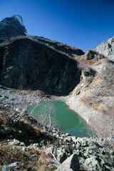 Obraz premium Mountain lake in autumn, Dombai, Russia.