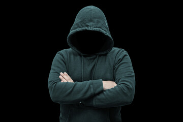 Mysterious faceless hooded anonymous criminal, silhouette of computer hacker, cyber terrorist or gangster on black background