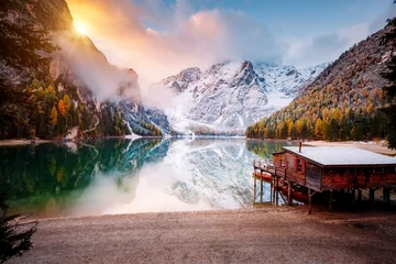 Papier Peint photo Lavable Dolomites Great view of the mighty rock above peaceful alpine lake Braies. National park Fanes-Sennes-Braies, Italy, Europe.
