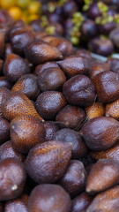 snake fruits in market