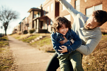 Father and son bonding outside