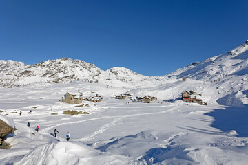 snowy landscape at Alpe Prabello in Valmalenco, Italy - 699690736