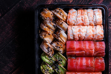 A set of delicious sushi rolls The view from the top of the eel and salmon sushi rolls