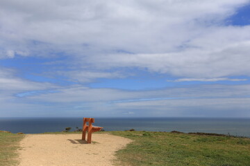 a bench on a viewpoint at howth peninsula