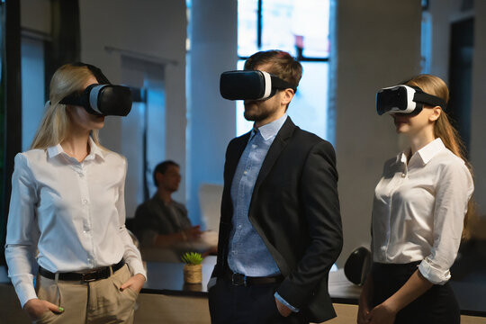 People are connected to AR and VR devices communicate with colleagues in office.high quality photo.concept of technology.