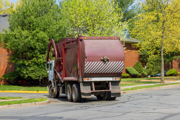 Garbage suburban disposal service truck working on streets sleeping area
