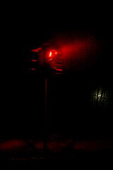 Red stop in mist