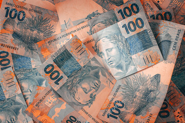 Brazil money, Financial concept, Brazilian 100 reais banknotes, Abstract fiery colors, Economics...