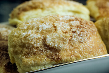 Puff pastry pie sprinkled with sugar.