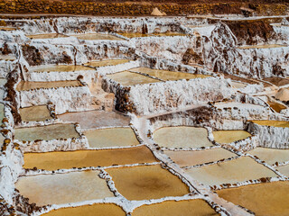 Amazing colors and geometries of Maras salt ponds in the sacred valley of Incas, Cusco region, Peru
