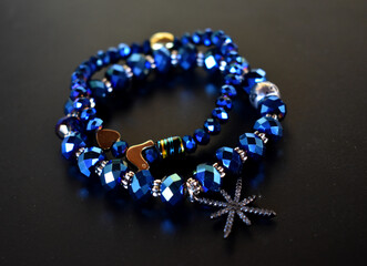 Two blue beaded bracelets