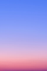 Red-blue gradient of clear cloudless sky during sunrise
