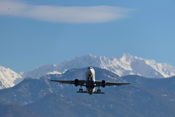 Fototapeta na wymiar airplane in the mountains