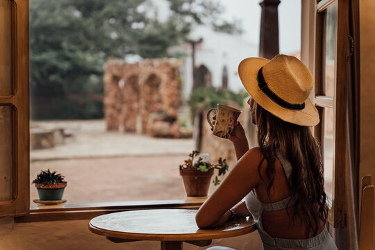 woman stearing out the window