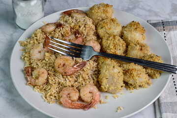 sauteed shrimp and rice  served with scallops