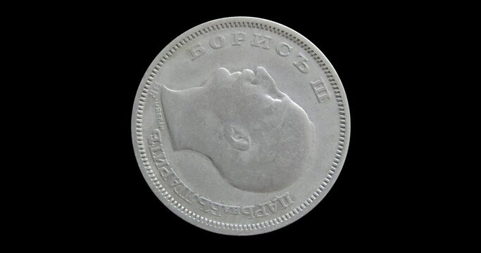 Obverse of Bulgaria coin 50 leva 1930 with portrait of tsar Boris, isolated in black background. 3d animation in 4k video.