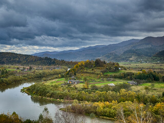 Fototapeta premium The landscape of Carpathian Mountains in the cloudy weather. Perfect weather condition in the spring season